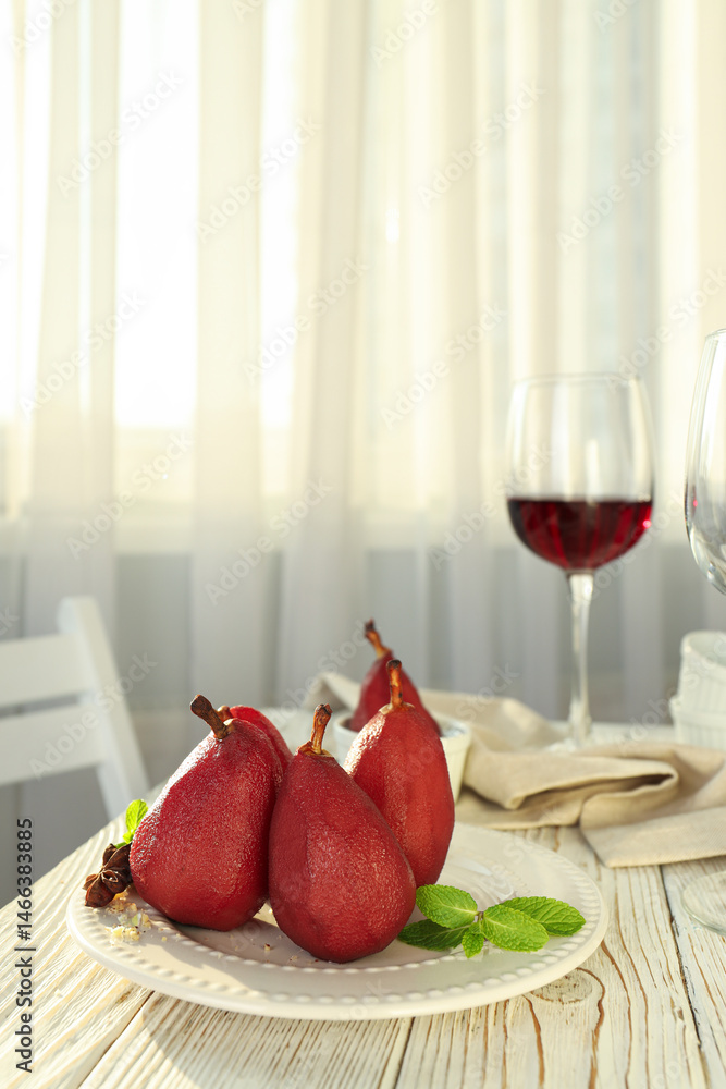Tasty and delicious food concept - pear in wine