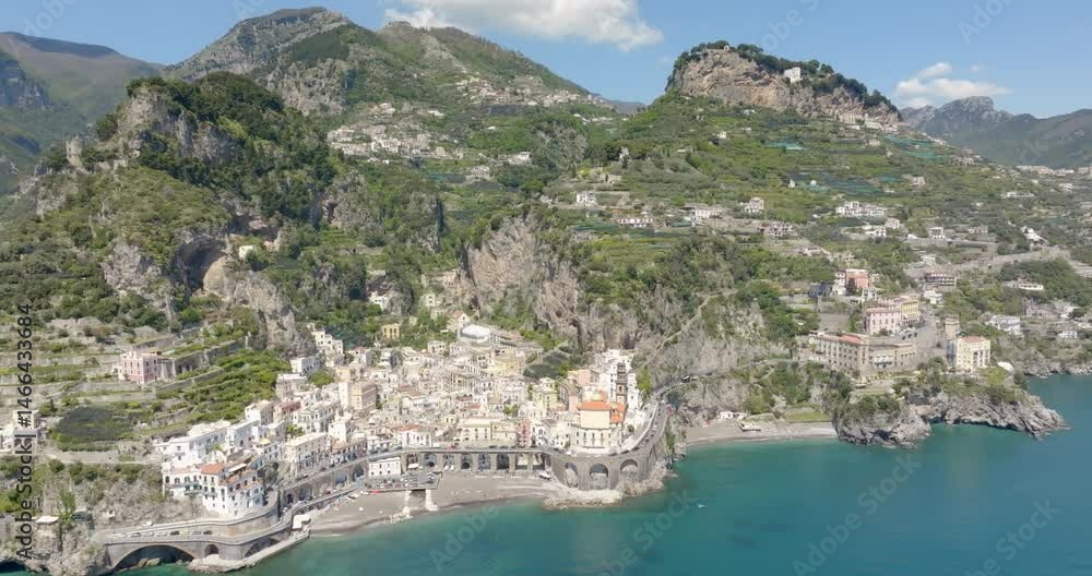 Aerial view of the town of Atrani, in the province of Salerno, in Campania, Italy. It is one of the most beautiful and touristic places on the Amalfi coast, overlooking the Mediterranean Sea. Aerial view of the town of Atrani, in the province of Salerno, in Campania, Italy. It is one of the most beautiful and touristic places on the Amalfi coast, overlooking the Mediterranean Sea.