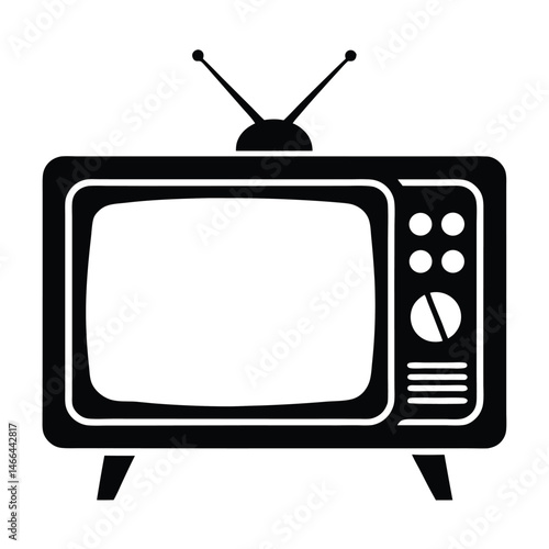 Retro television with antenna stands elegantly on two legs in monochrome look