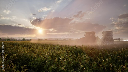 Farming Tractor Plowing And Spraying On Field