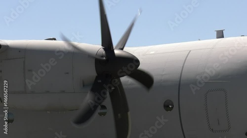 Starting a military aircraft engine, turning a propeller