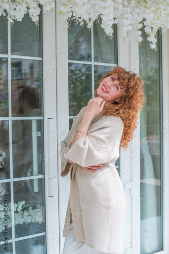 Free Download Smiling Redhead Woman in City. Candid Moments. Lady  in her late 30s or early 40s, smiling sincerely in an urban setting - GFXLoad