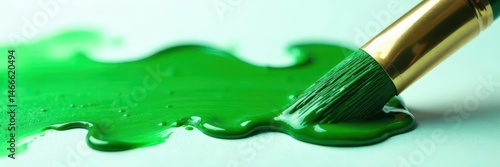 A thick glob of emerald green clings to a paintbrush ,  vibrant,  close-up,  art