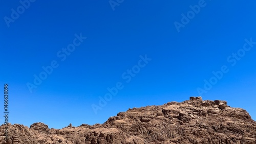 Mountain landscape with blue sky. Copy space.