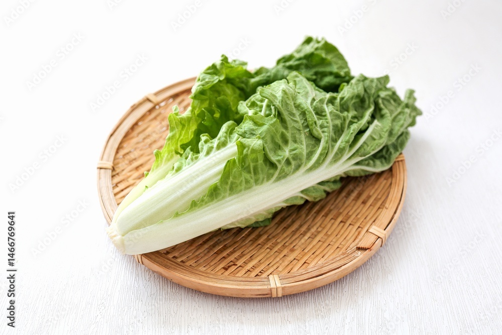 Chinese cabbage in the basket on white background Chinese cabbage in the basket on white background