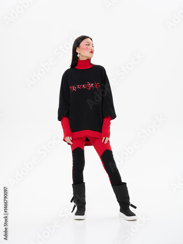 Obraz na plátne Street style fashion, Asian model in faux fur clothes on white studio background