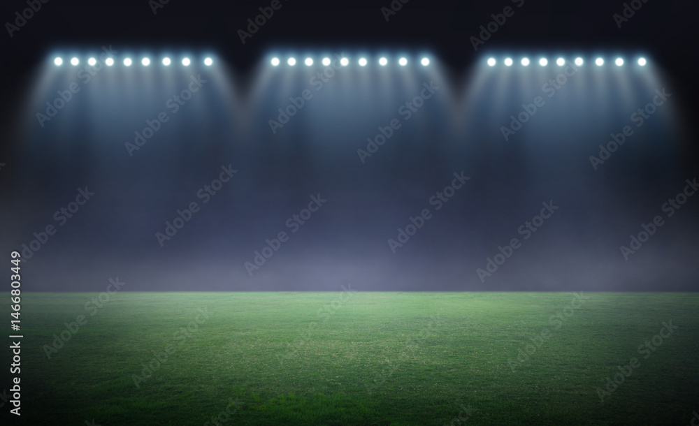 Naklejka premium Green soccer field, bright spotlights,