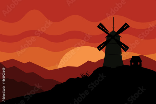 hilltop windmill silhouetted against a fiery dusk