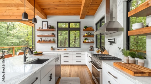 Modern farmhouse kitchen with exposed beams, showcasing an open concept design, featuring white cabinets, a large island, and ample natural light