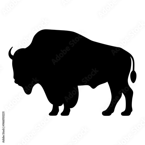 Black silhouette of a bison, standing tall in stark contrast