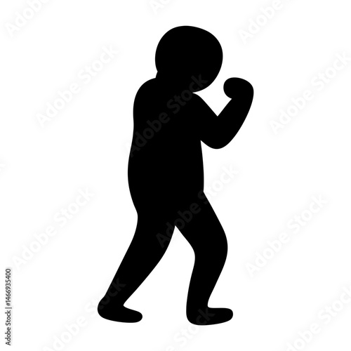 Silhouette of person in a fighting stance ready for action or selfdefense