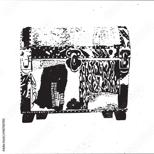 A vintage black truck rests on a weathered road surface.