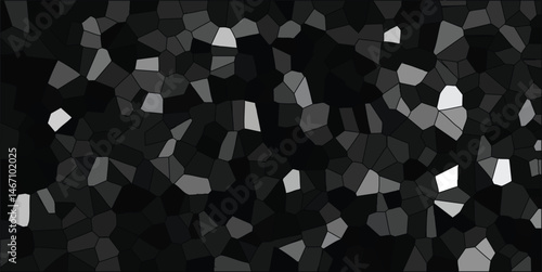 Abstract mosaic background comprised of irregularly shaped dark grey and black polygons with scattered highlights offering a textured and visually engaging composition.