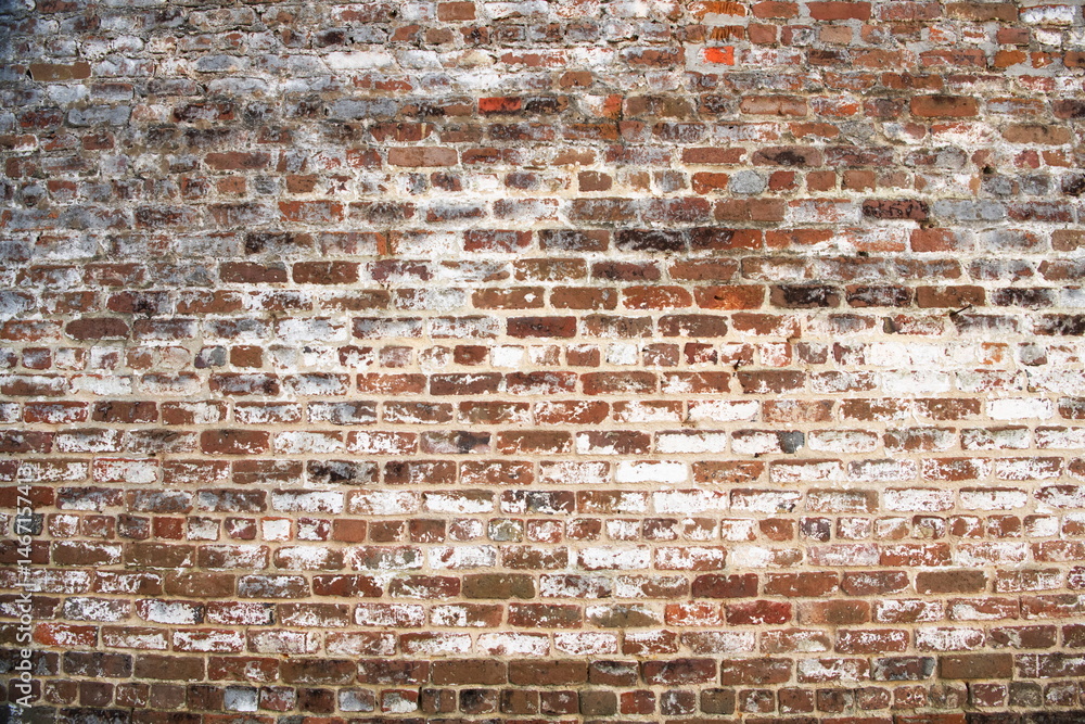 Naklejka premium background of old brick wall, surface of ancient red brickwork