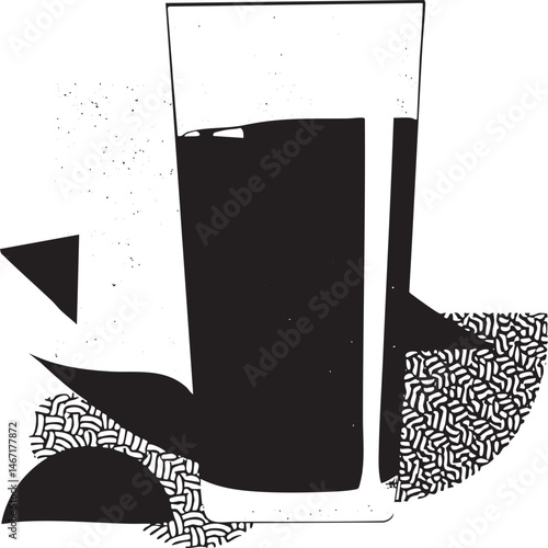 A tall glass of dark liquid rests on a textured surface.