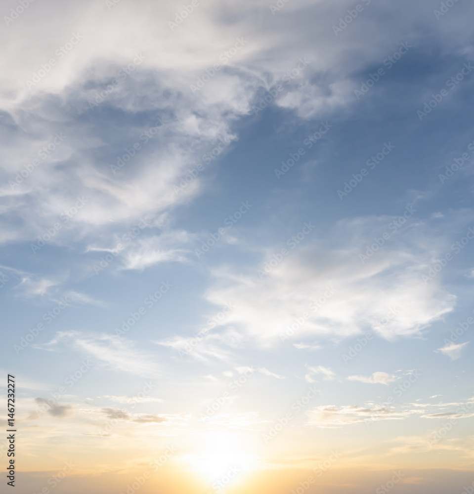 Obraz premium Front view and full frame of beautiful morning or evening blue and orange sky with cloudy while sunsets or sunrises taken at the sea used as natural blackground texture