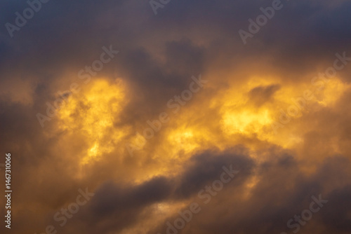 Sky with Stormy Dark Clouds at Sunset. Abstract Texture Background Pattern.