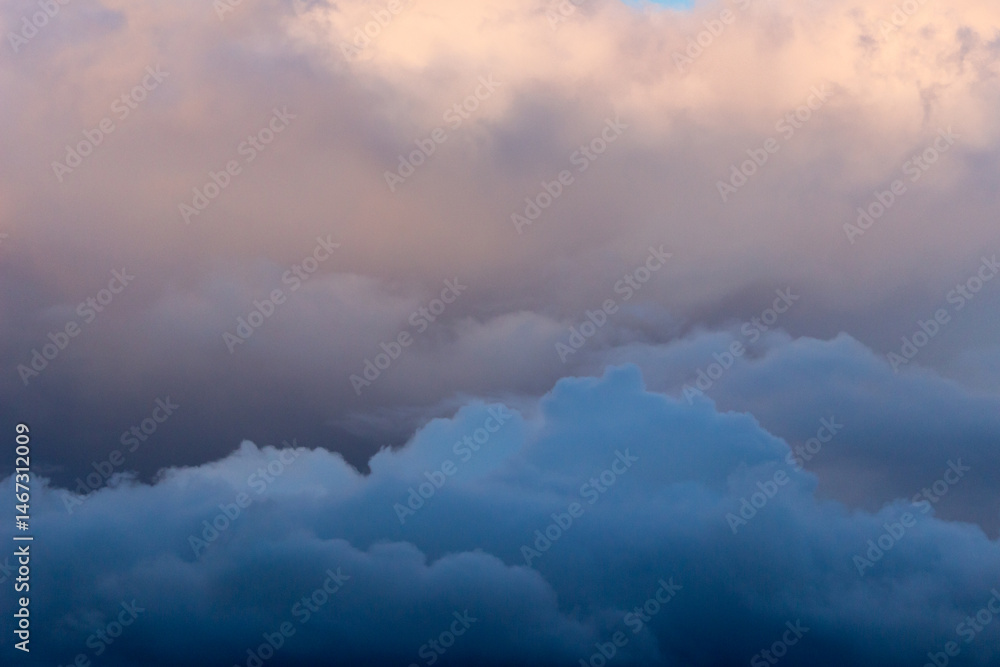 Obraz premium Sky with Stormy Dark Dramatic Blue Clouds. Abstract Texture Background Pattern.