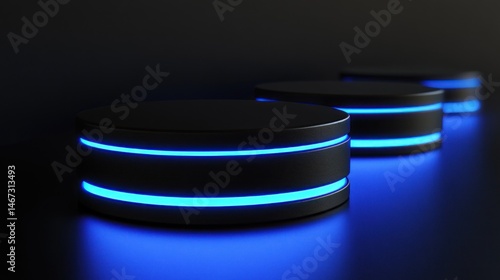 Three black cylindrical platforms with blue neon lights, on dark background.