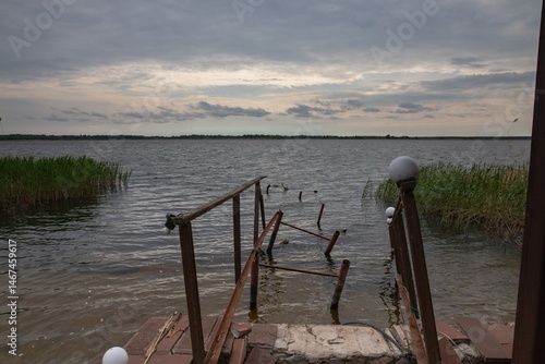 Old broken dock waiting for restoration, hope for renewal and rebuilding
