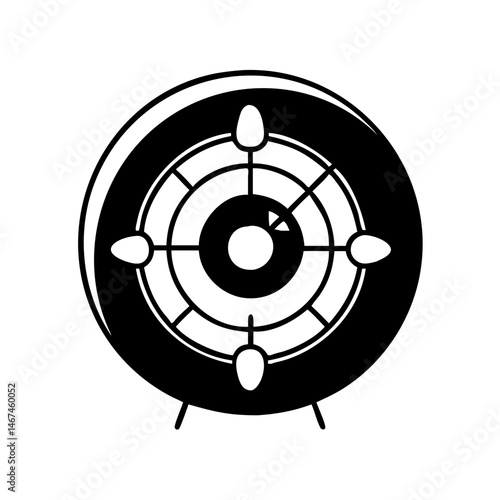 Black and white dartboard with stand, ready for a game of skill