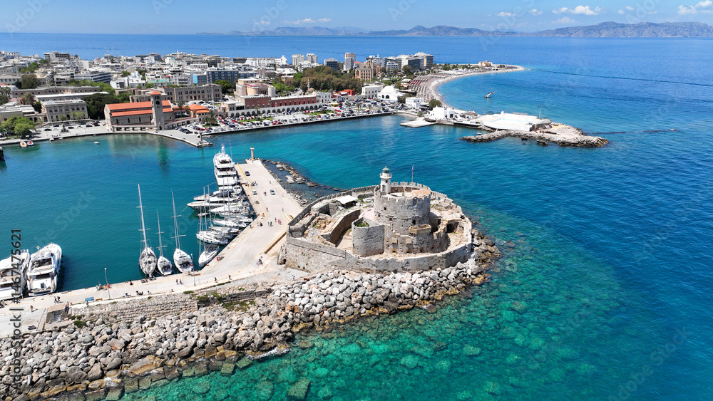 Aerial drone photo of scenic Saint Nicholas Fortress built in main waterfront of Mandraki near windmills pier, Rhodes town, Dodecanese, Greece