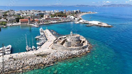 Obraz na płótnie Aerial drone photo of scenic Saint Nicholas Fortress built in main waterfront of Mandraki near windmills pier, Rhodes town, Dodecanese, Greece w salonie
