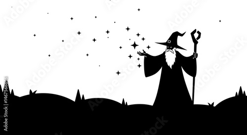 Silhouette of a landscape with stars featuring hills and sparse vegetation