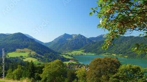 Schliersee summer landscape with gentle lake waves, relaxing forest paths and unspoiled alpine surroundings in Bavaria