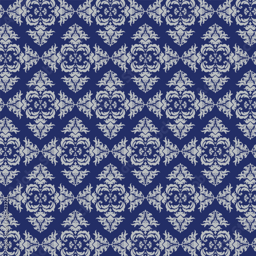 Seamless pattern with damask ornaments. Textured background.