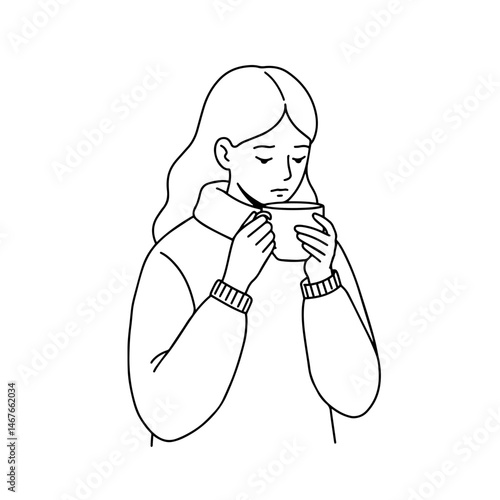 Young woman enjoying a warm drink in a cozy setting  