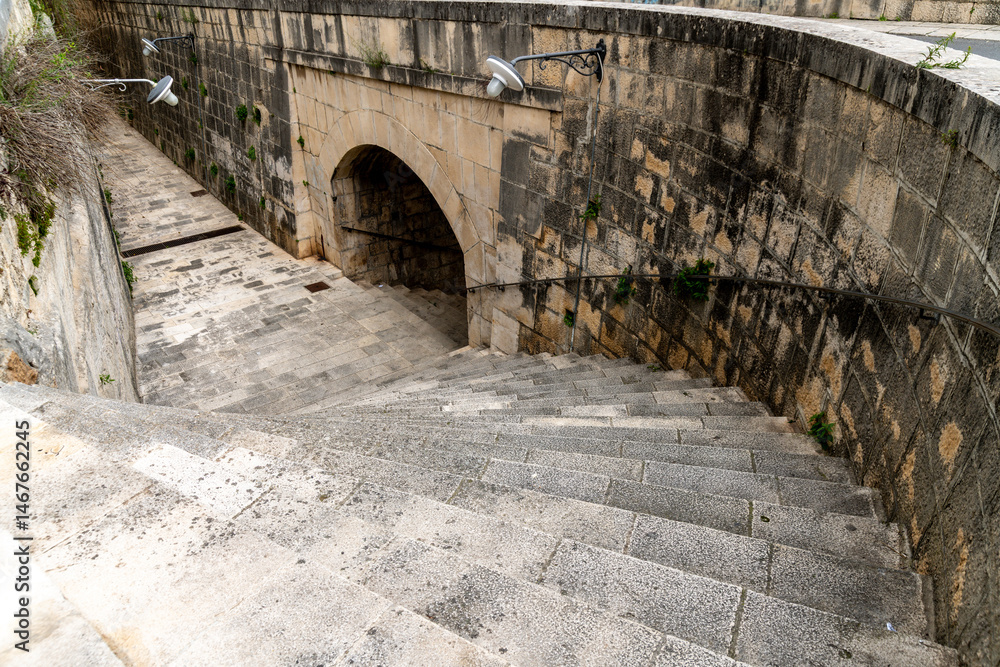 Obraz premium Historic Stone Staircase and Archway in Ragusa