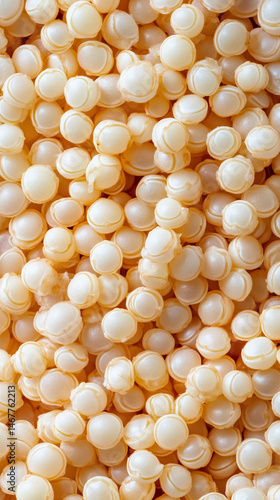 Close-up of raw white quinoa seeds showing detailed texture and natural pattern. Symbolizes health, nutrition, and organic simplicity in a wholesome superfood background for culinary or wellness theme