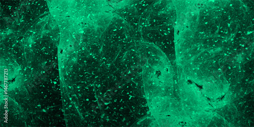 Abstract texture of a deep green, cloudy background with stormy sky or turbulent cosmic nebula. Soft blending between darker forest green areas and lighter emerald or jade. Vivid, moody, atmosphere