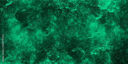 Abstract texture of a deep green, cloudy background with stormy sky or turbulent cosmic nebula. Soft blending between darker forest green areas and lighter emerald or jade. Vivid, moody, atmosphere