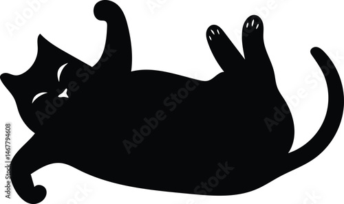Silhouette of a relaxed cat on its back in a playful pose