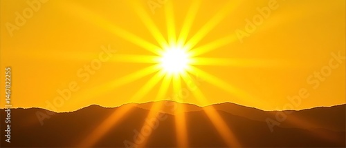 Bright sun rising over mountains; nature scene