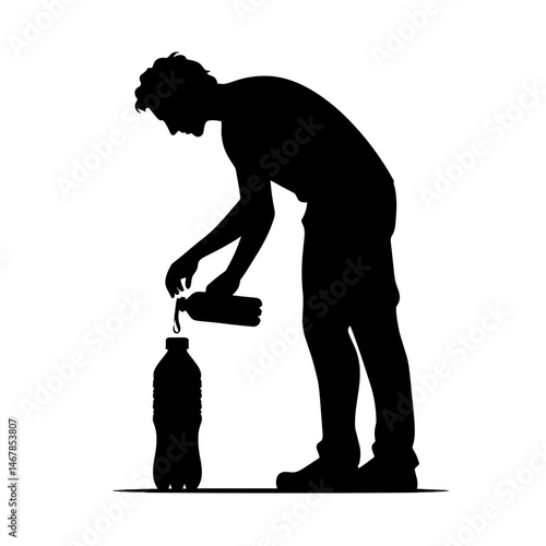 Silhouetted man pouring bottle against white background