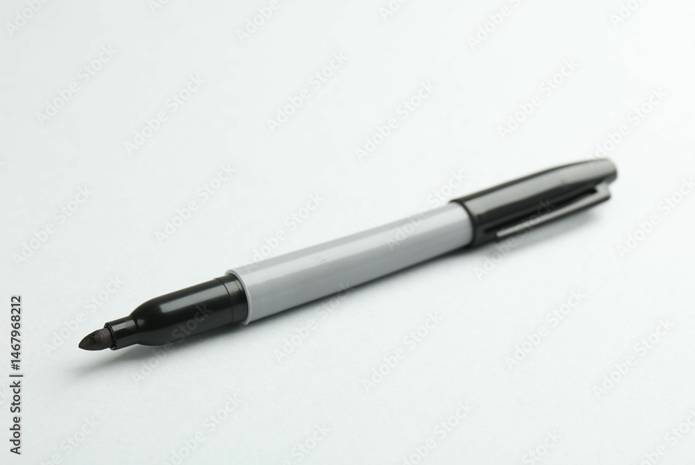 One black marker on light background. Space for text One black marker on light background. Space for text