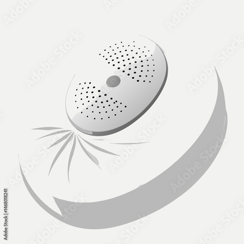 A white speakers featuring a distinct black dot on its body.