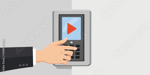 Hand pressing a button on a digital control panel  