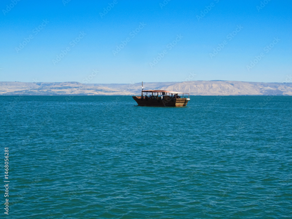 Obraz premium a beautiful ship is sailing in the blue sea