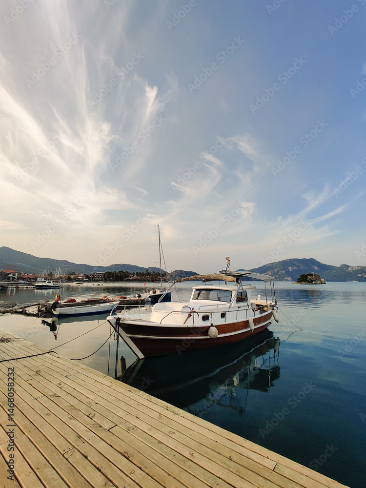 Fototapeta premium beautiful ships and boats are moored near the shore