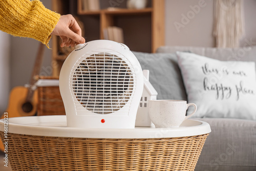 Woman using modern electric...