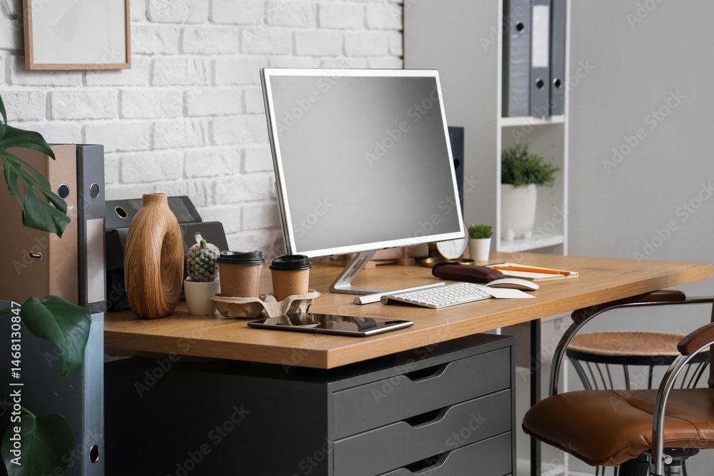 Comfortable workplace with modern computer in office Comfortable workplace with modern computer in office