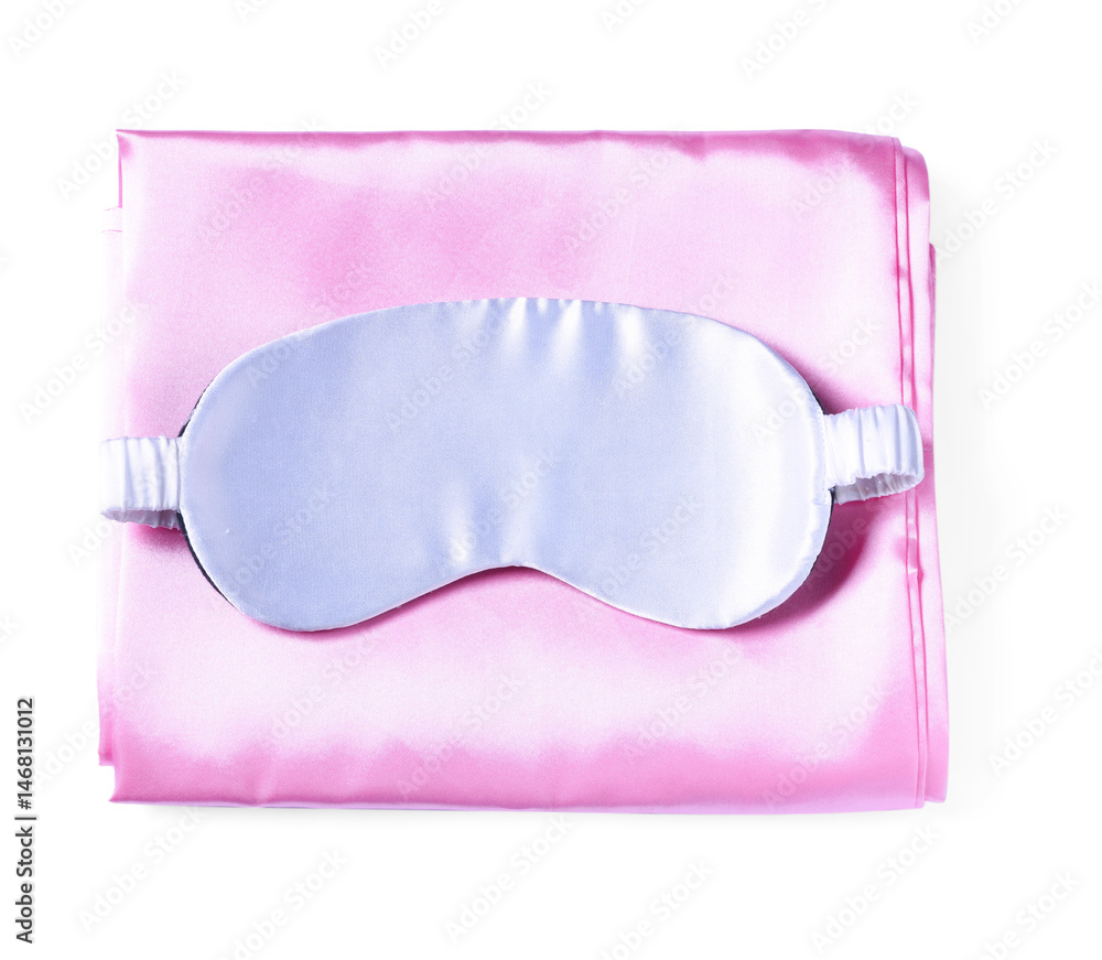 Silky bed linens and sleeping mask on white background, top view Silky bed linens and sleeping mask on white background, top view