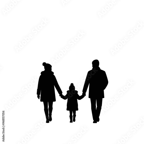 Silhouette of family in winter clothes walking together holding hands