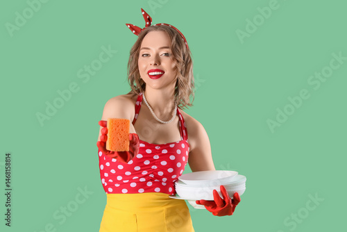 Young pin-up housewife with...