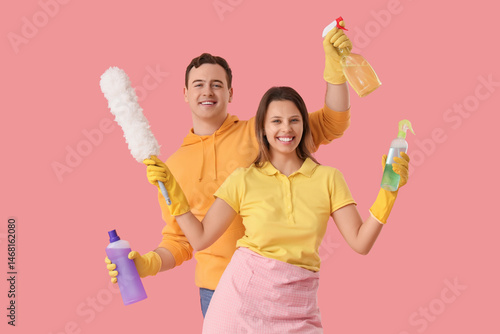 Young couple with cleaning ...