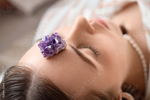 Young woman meditating with...